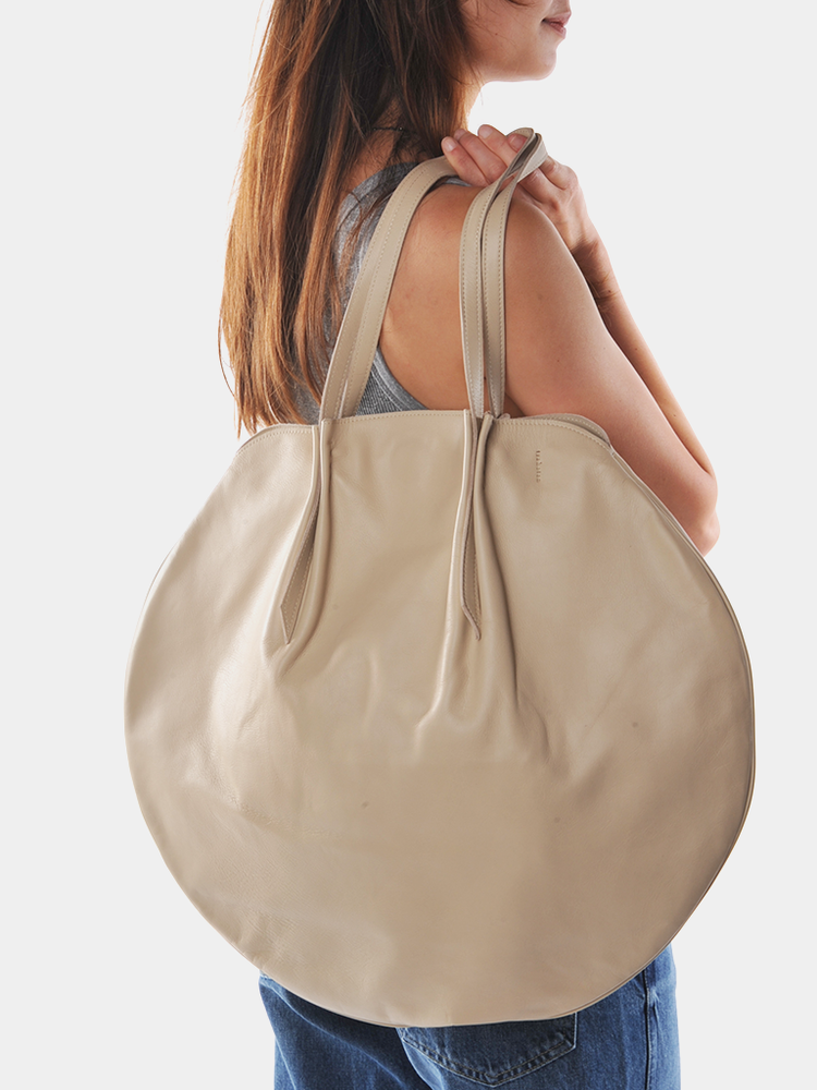 
                  
                    Trakatan Bags - Latte Large Round Tote - Roztayger
                  
                