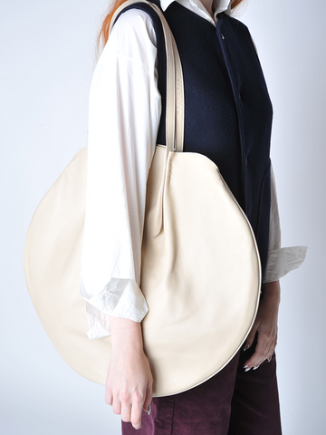 
  
	
    
	
    Latte Large Round Tote