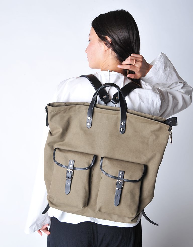 
                  
                    Olive Green and Black Canvas Rucksack - Roztayger
                  
                