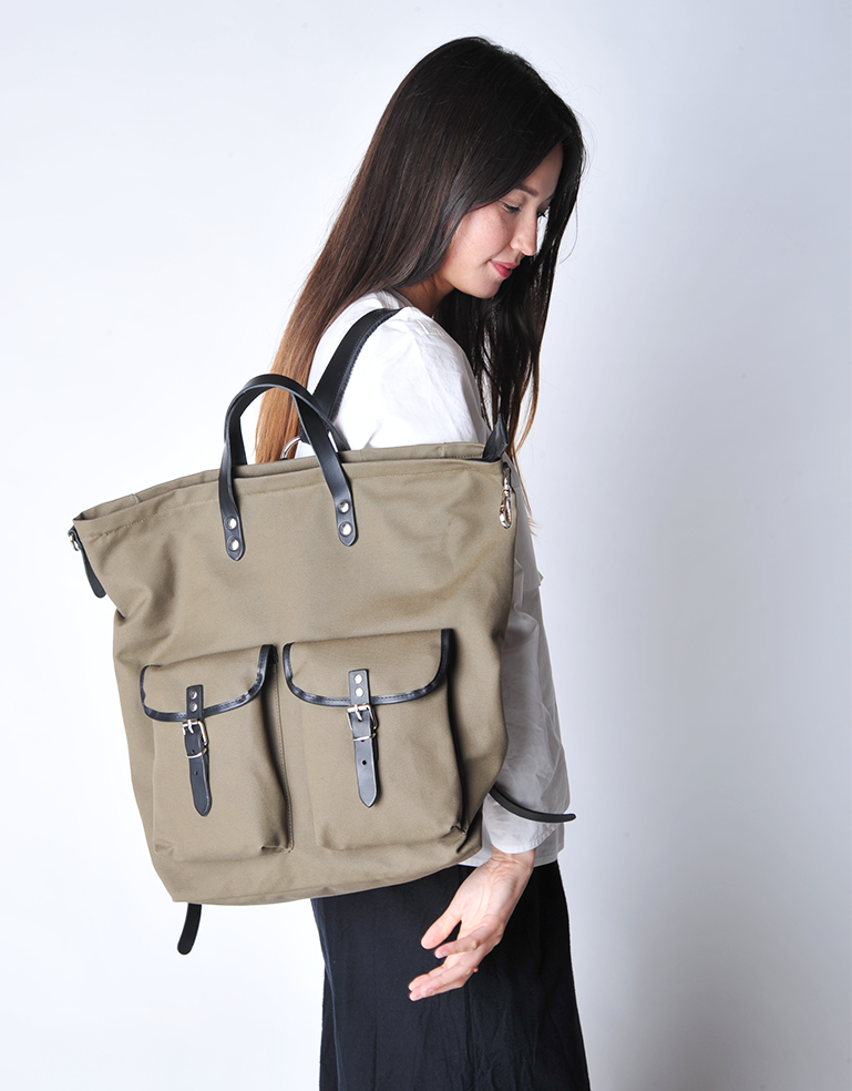 
                  
                    Olive Green and Black Canvas Rucksack - Roztayger
                  
                
