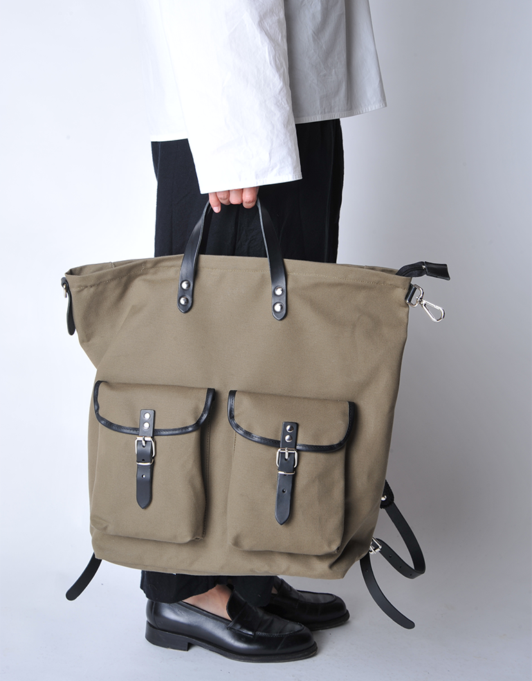 
                  
                    Olive Green and Black Canvas Rucksack - Roztayger
                  
                